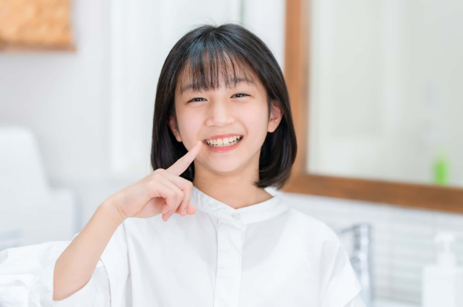 フッ素塗布で虫歯予防をした女の子